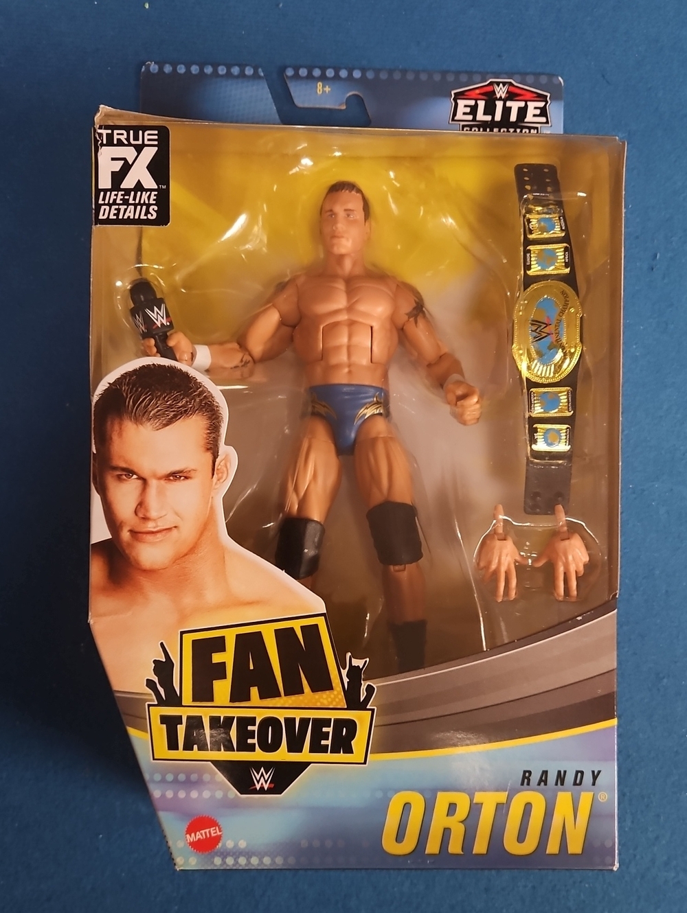Mattel WWE Elite Action Figure - Blue & Black Gear with Gold Belt